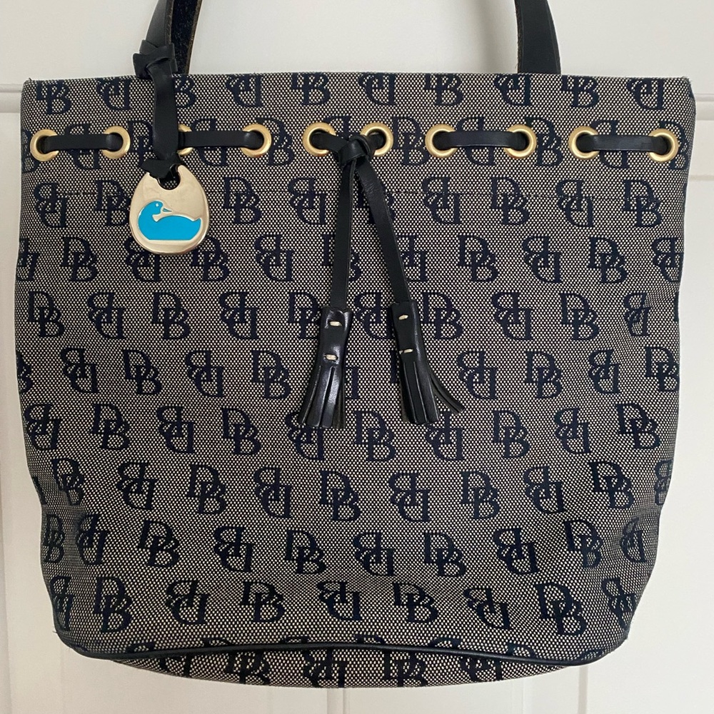 Black Dooney & Bourke Bag. Has a few stains on the inside none on the outside.